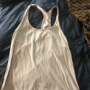 Light pink loose lulu tank size 2